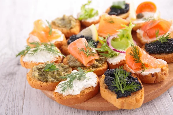 Tapas with cheese, salmon,pate — Stock Photo, Image