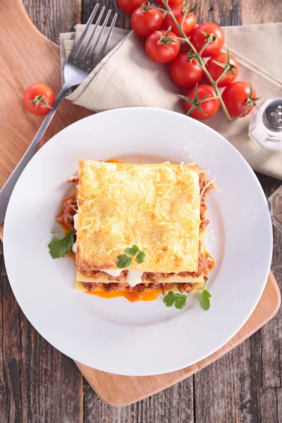 Lasagna with parsley on plate — Stock Photo, Image