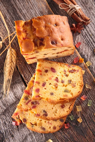 Fruit cake on wood — Stock Photo, Image