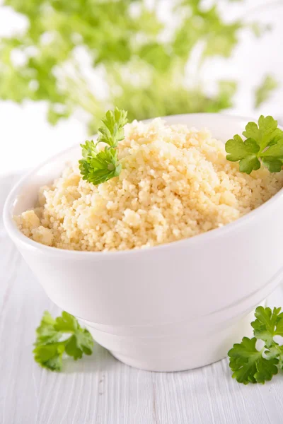 Semolina com salsa em tigela — Fotografia de Stock