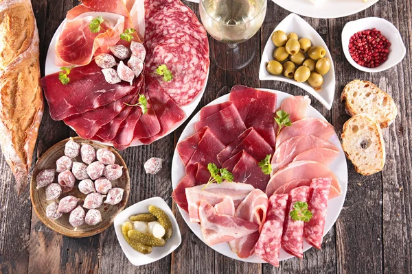 Meat assortment with olives — Stock Photo, Image