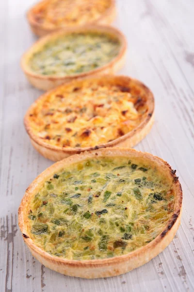 Quiche pies on wood — Stock Photo, Image