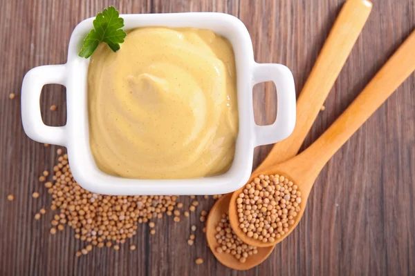 Mustard with herb and grain — Stock Photo, Image