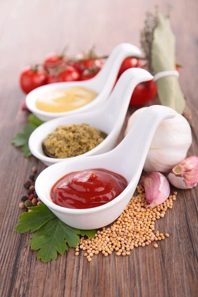 Mustard,ketchup and pesto sauce — Stock Photo, Image