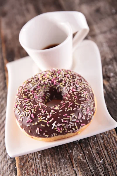 Donuts et tasse à café — Photo