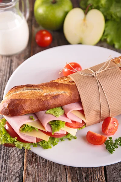 Tasty sandwich with ham — Stock Photo, Image