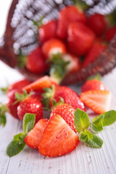 Sliced strawberry with mint — Stock Photo, Image