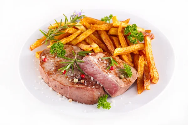 Grilled steak and french fries — Stock Photo, Image