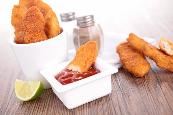 Fried chicken and ketchup — Stock Photo, Image