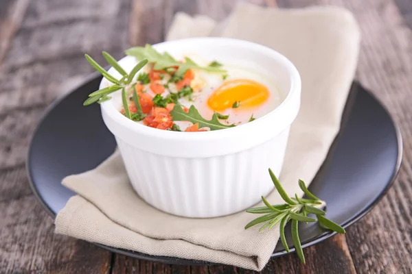 Bake eggs in white bowl — Stock Photo, Image