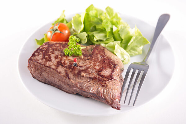 Grilled beef in white plate