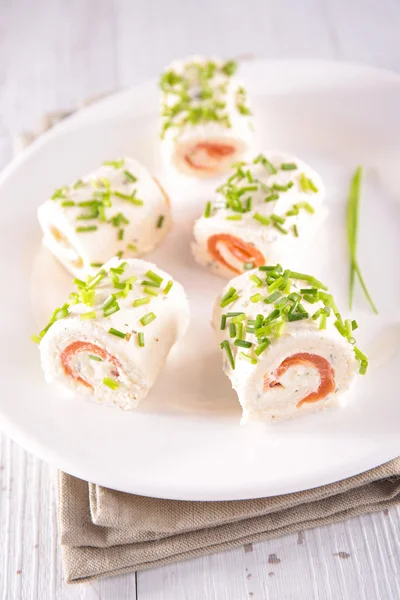 Canape with cheese, salmon and herbs — Stock Photo, Image