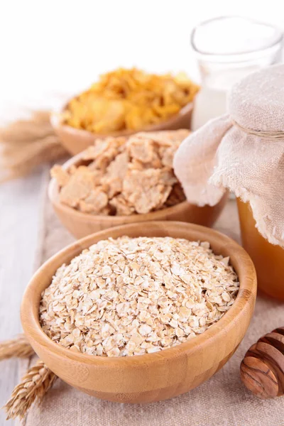 Bowls of different flakes — Stock Photo, Image