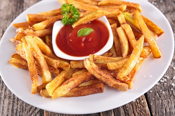 Batatas fritas e ketchup — Fotografia de Stock