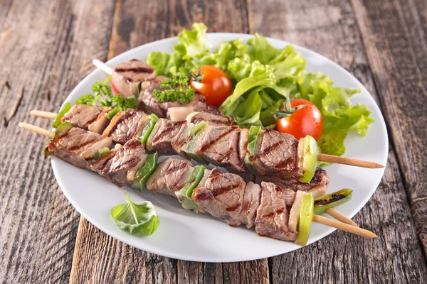 Grilled meat on sticks — Stock Photo, Image