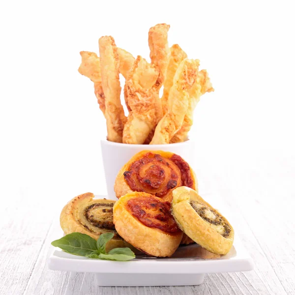 Crispy snacks in white cup — Stock Photo, Image