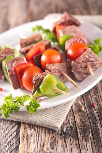 Grilled meat on stick — Stock Photo, Image