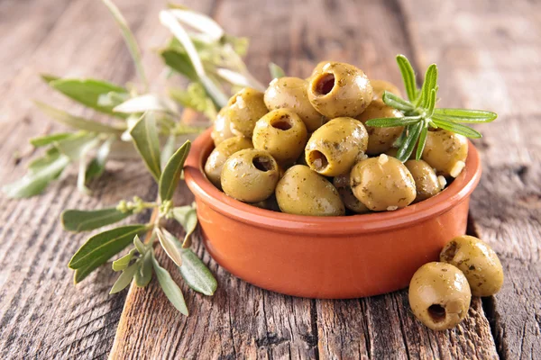 Green olives with rosemary — Stock Photo, Image