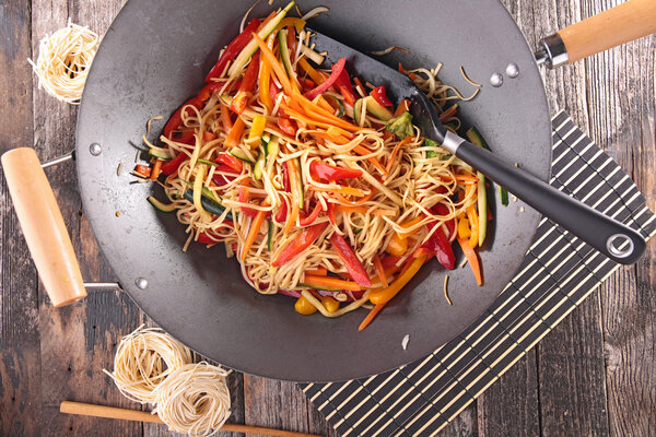 Asian cuisine with tasty sliced vegetables