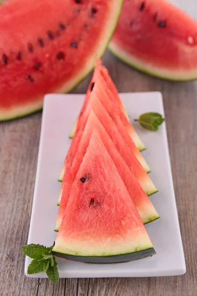 Watermelon slices on plate — Stock Photo, Image