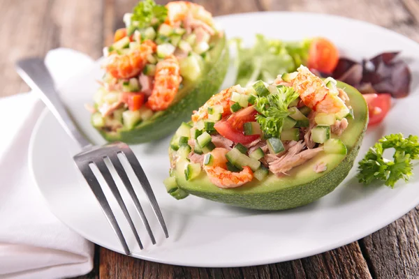 Salad in avocado bowls — Stock Photo, Image