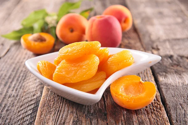 Dry apricots in bowl — Stock Photo, Image