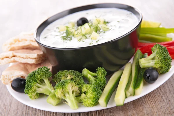 Cream soup in bowl  with fresh vegetables — Stock Photo, Image
