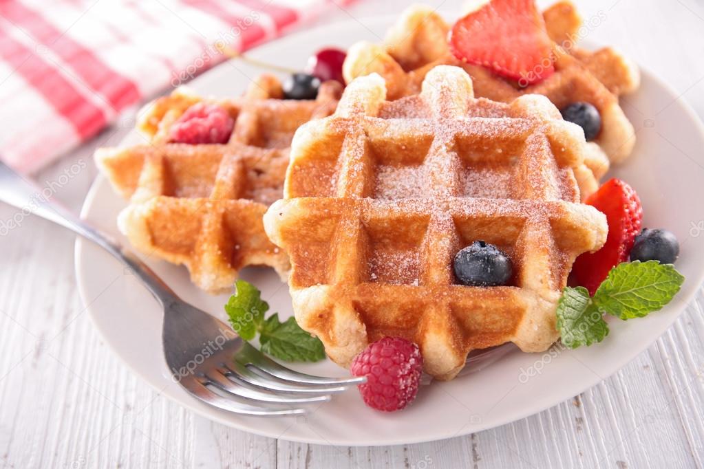 Waffles with ice cream and berries