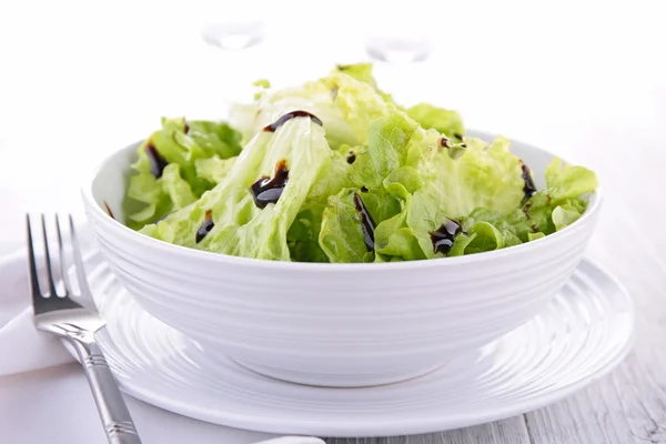 Green lettuce in bowl — Stock Photo, Image