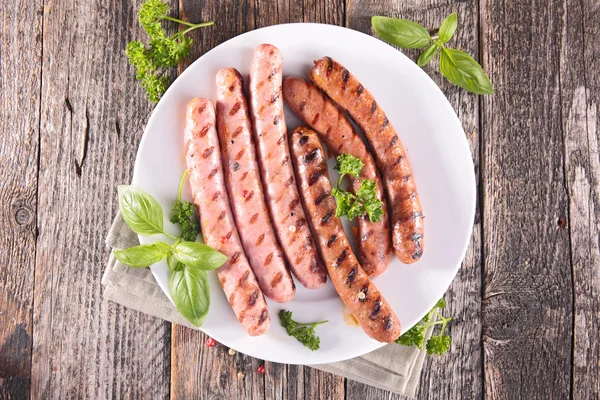 Grilled sausages with herbs — Stock Photo, Image