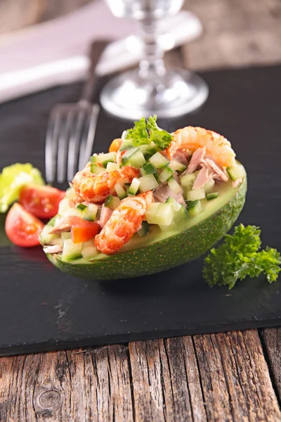 Fresh salad in bowl from avocado — Stock Photo, Image