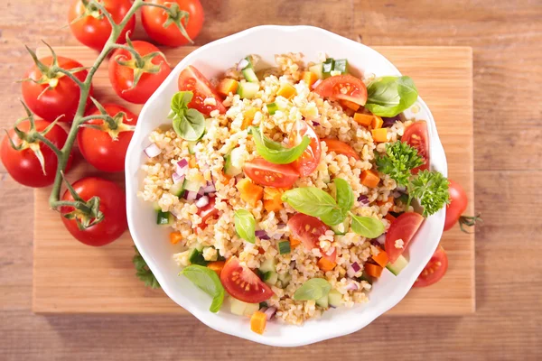 Quinoa salad with tomatoes — Stock Image Quinoa salad with tomatoes Royalty Free Stock Photos