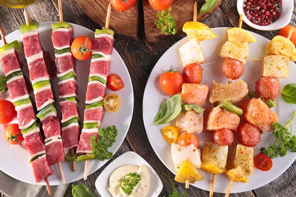 Barbecue party. fish and meat skewers — Stock Photo, Image