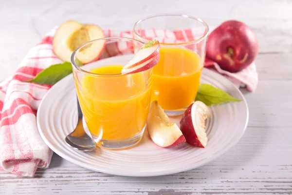 Peach juice in glasses — Stock Photo, Image