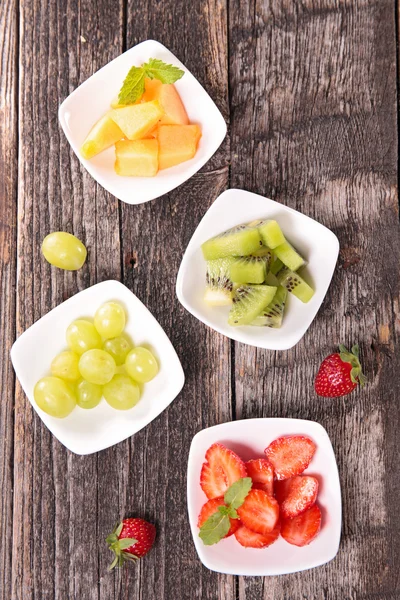 Assorted Fruits on plates — Stock Photo, Image