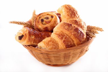 assorted pastries in basket clipart