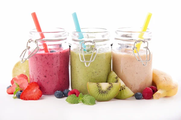 Smoothie in jars with sticks — Stock Photo, Image