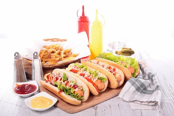 Hot dog with french fries — Stock Photo, Image