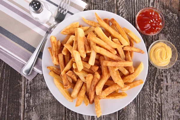 French fries and sauce — Stock Photo, Image