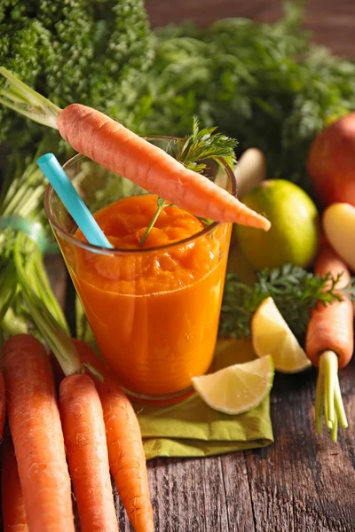 Carrot smoothie in glass — Stock Photo, Image