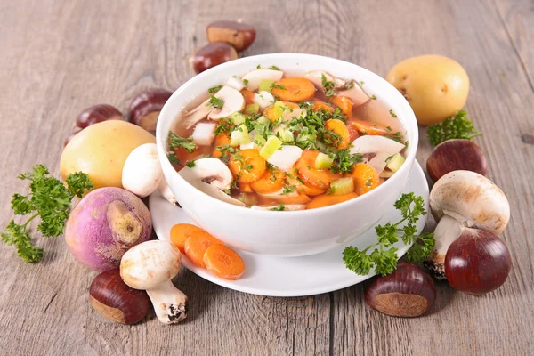Vegetable soup with ingredients — Stock Photo, Image