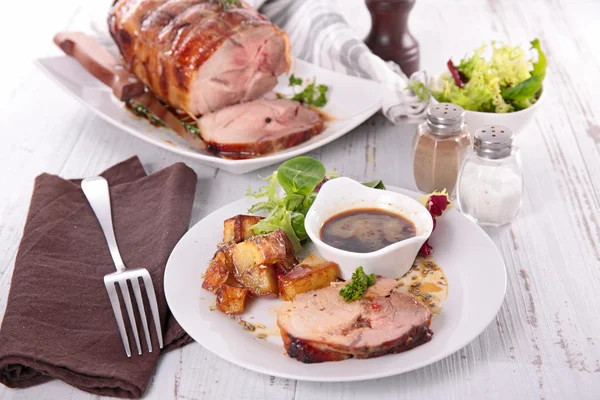 Baked pork with salad — Stock Photo, Image