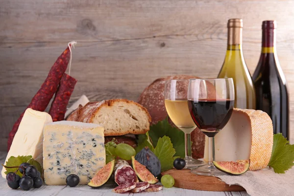 wine, cheese, bread, sausages