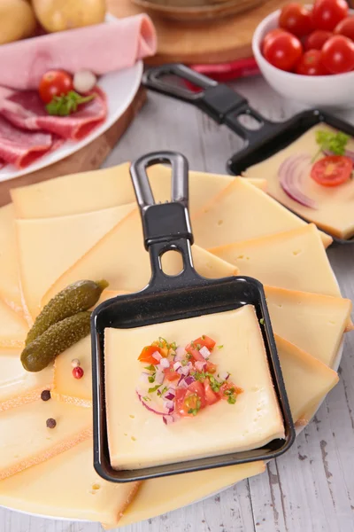 Raclette dinner and ingredients — Stock Photo, Image