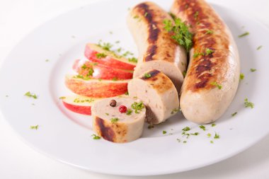 bratwurst sausages and apple