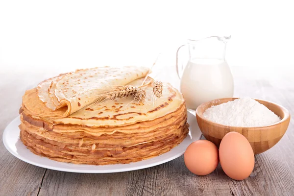 Crepes, pancakes and ingredients — Stock Photo, Image