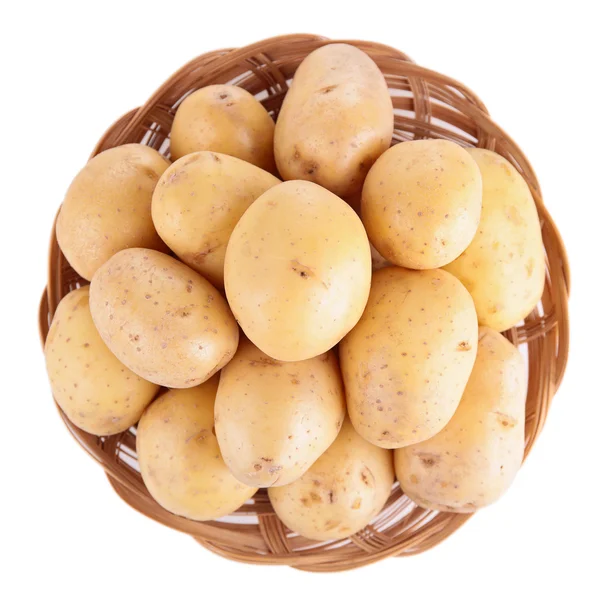 Raw potatoes in basket — Stock Photo, Image