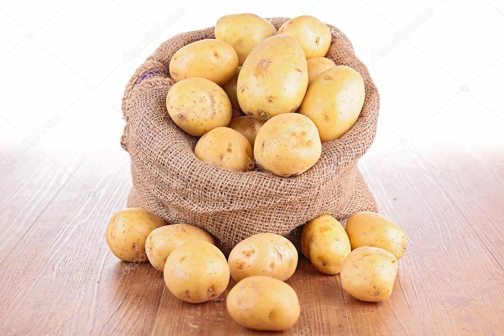 raw potatoes in sack