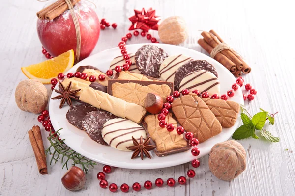 Christmas biscuits with decorations — Stock Photo, Image