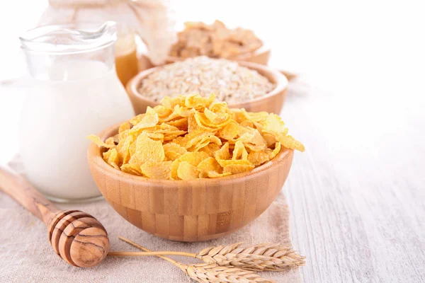 Assorted cornflakes with milk — Stock Photo, Image